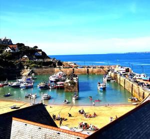 a view of a harbor with boats in the water at Gwynn Lodge in Newquay