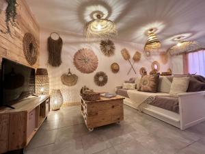 Fotografia z galérie ubytovania Les P'tits Apparts d'Angie - Logement Bohème v destinácii Porto-Vecchio + 25 fotografií
