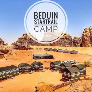 a group of structures in a desert with the words boom tent rental camp at Beduin Star Trail Camp in Wadi Rum