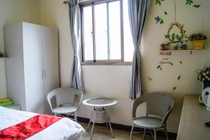 Posezení v ubytování Ding Ding Homestay + 4 fotografie