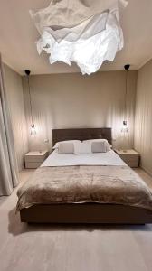 A bed or beds in a room at Casa Adriana
