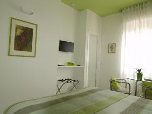 Postel nebo postele na pokoji v ubytování B&B Linea Verde