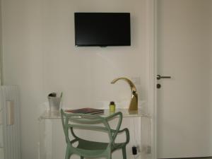 TV a/nebo společenská místnost v ubytování B&B Linea Verde