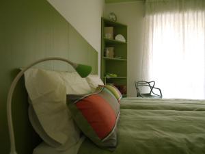 Postel nebo postele na pokoji v ubytování B&B Linea Verde