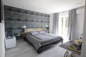 Posteľ alebo postele v izbe v ubytovaní O'Toole's, Plitvice