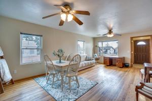 a living room with a table and chairs and a couch at Pet-Friendly Torrington Vacation Rental Near River in Torrington