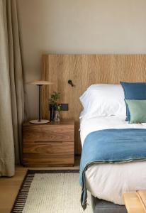Postel nebo postele na pokoji v ubytování Hotel Ur Bare