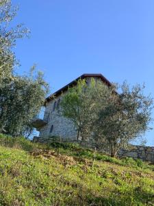 an old building on top of a hill at Villa Shehu in Kuçovë
