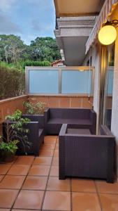 Posedenie v ubytovaní Apartamento con Terraza y Piscina, Baiona
