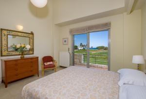 A bed or beds in a room at Gea Maleme