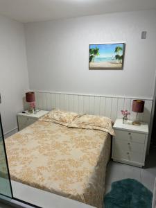 Postel nebo postele na pokoji v ubytování Peroba Ville Apartamento, Maragogi