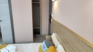 Posteľ alebo postele v izbe v ubytovaní Chambre pour 2 personnes dans la banlieue parisienne (Bondy)