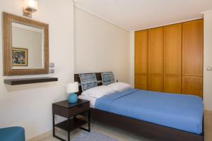A bed or beds in a room at Gea Maleme