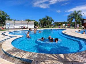 a group of people in a swimming pool at Naturaleza Termal in Chajarí