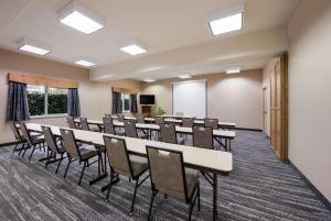 a conference room with a long table and chairs at Best Western Plus Kentwood Lodge in Sun Valley