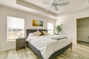 a bedroom with a bed and a ceiling fan at Home with Lanai and Community Perks in The Villages! in Leesburg +31 photos
