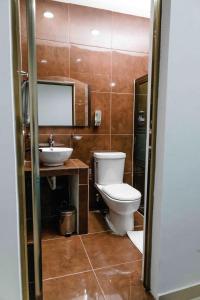 Koupelna v ubytování Hotel Naomi City center