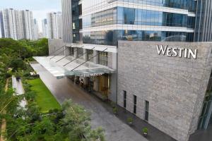 a view of a building with a sign on it at The Westin Jakarta in Jakarta