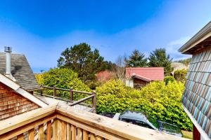 a view from the balcony of a house at Cannon Beach Cottage in Cannon Beach