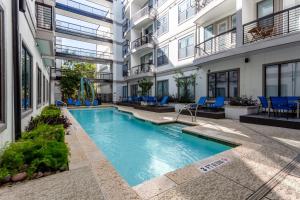 a swimming pool in the middle of a building at Locale South Congress - Austin in Austin