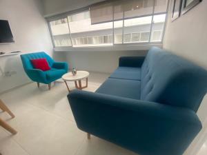 A seating area at HABITACION CON BAÑO PRIVADO PARA 1 O 2 PERSONAS