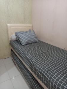 Krevet ili kreveti u jedinici u objektu Green Pramuka City