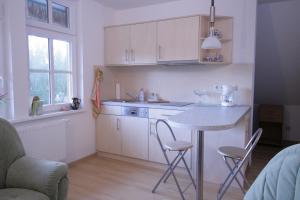 Kuchyň nebo kuchyňský kout v ubytování Haus Koppelweg FW-Fisch + 2 fotografie