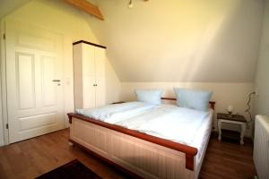 Giường trong phòng chung tại Wohnung-Salzaster