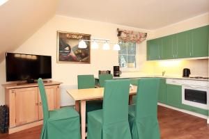 Kuchyň nebo kuchyňský kout v ubytování Haus Kranich App 426 + 8 fotografií