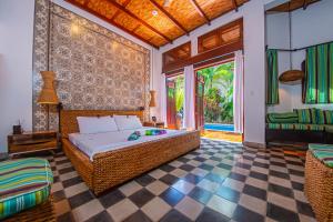 מיטה או מיטות בחדר ב-Casa Bubu Guest House