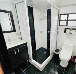 Ванная комната в Casa de campo en Barbosa - a 3 minutos del centro