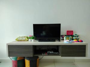 a desk with a computer on top of it at Ampang 2-4 pax Studio AmpPoint in Ampang