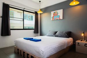 Postel nebo postele na pokoji v ubytování Sleep Guesthouse