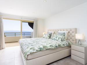 Posteľ alebo postele v izbe v ubytovaní Dúplex Moderno de Lujo con Terraza, Vista al Mar y Wi-Fi 600 mb - ES-279-10