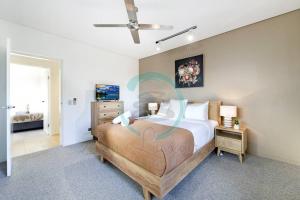 Voodi või voodid majutusasutuse ZEN Oceania - 2BR Ocean View toas