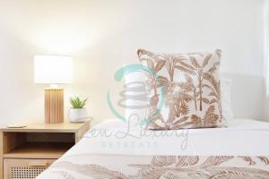 Voodi või voodid majutusasutuse ZEN Oceania - 2BR Ocean View toas