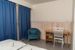 Postel nebo postele na pokoji v ubytování Guesthouse Borealis