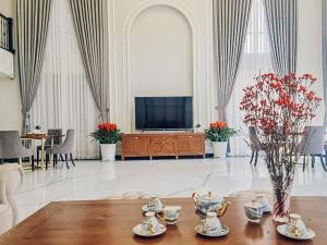 TV a/nebo společenská místnost v ubytování Sabina Luxury Boutique Hotel & Villa