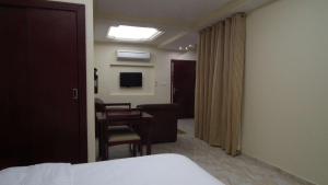 TV o dispositivi per l'intrattenimento presso Al Ferdous Hotel Apartments