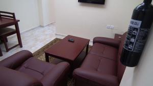 Area soggiorno di Al Ferdous Hotel Apartments