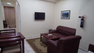TV o dispositivi per l'intrattenimento presso Al Ferdous Hotel Apartments