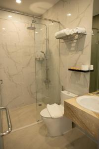 Kúpeľňa v ubytovaní Ruby Hotel