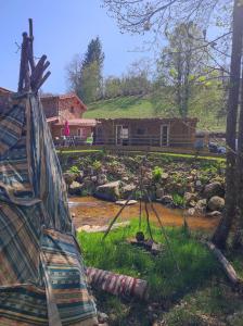 Vonkajšia záhrada v ubytovaní Le Moulin de la Fortie, Gîtes