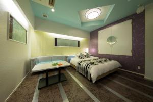Postel nebo postele na pokoji v ubytování HOTEL AUBE