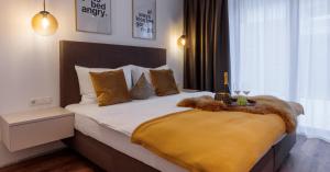 A bed or beds in a room at Wein Neururer