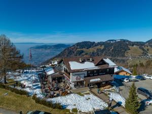 an aerial view of a ski lodge in the mountains at Le Coucou Hotel Restaurant & Lounge-Bar in Montreux