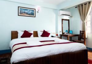 Voodi või voodid majutusasutuse Thamel Eco Home toas