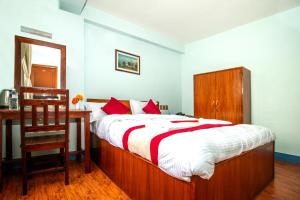 Voodi või voodid majutusasutuse Thamel Eco Home toas