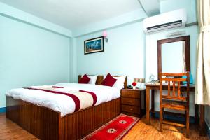 Voodi või voodid majutusasutuse Thamel Eco Home toas