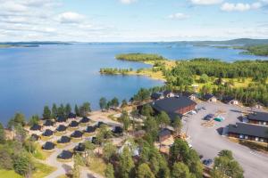 an aerial view of the resort and lake at Wilderness Hotel Inari & Igloos in Inari